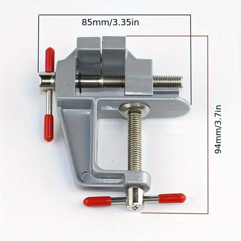 Mini aluminum bench vise with adjustable table clamp for DIY projects.