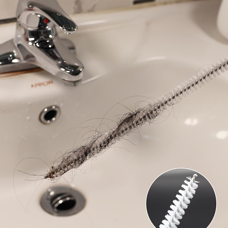 Introducing a versatile drain cleaning brush specially crafted for unclogging kitchen and bathroom pipes. This tool boasts an ergonomically designed handle for easy gripping, a reusable socket tool, and operates without the need for electricity.