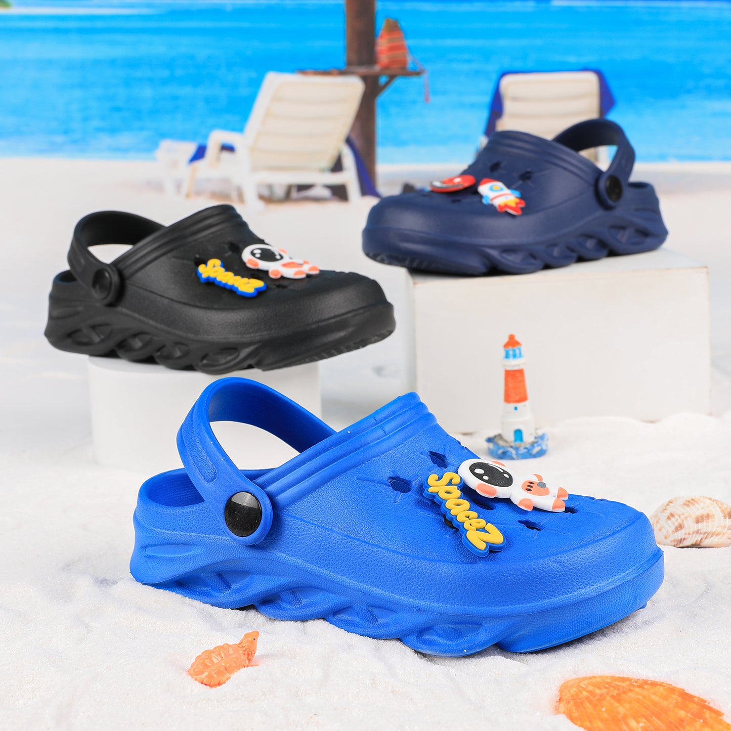 Stylish closed-toe slip-on sandals with cartoon charms for kids, breathable and non-slip for indoor and outdoor use.