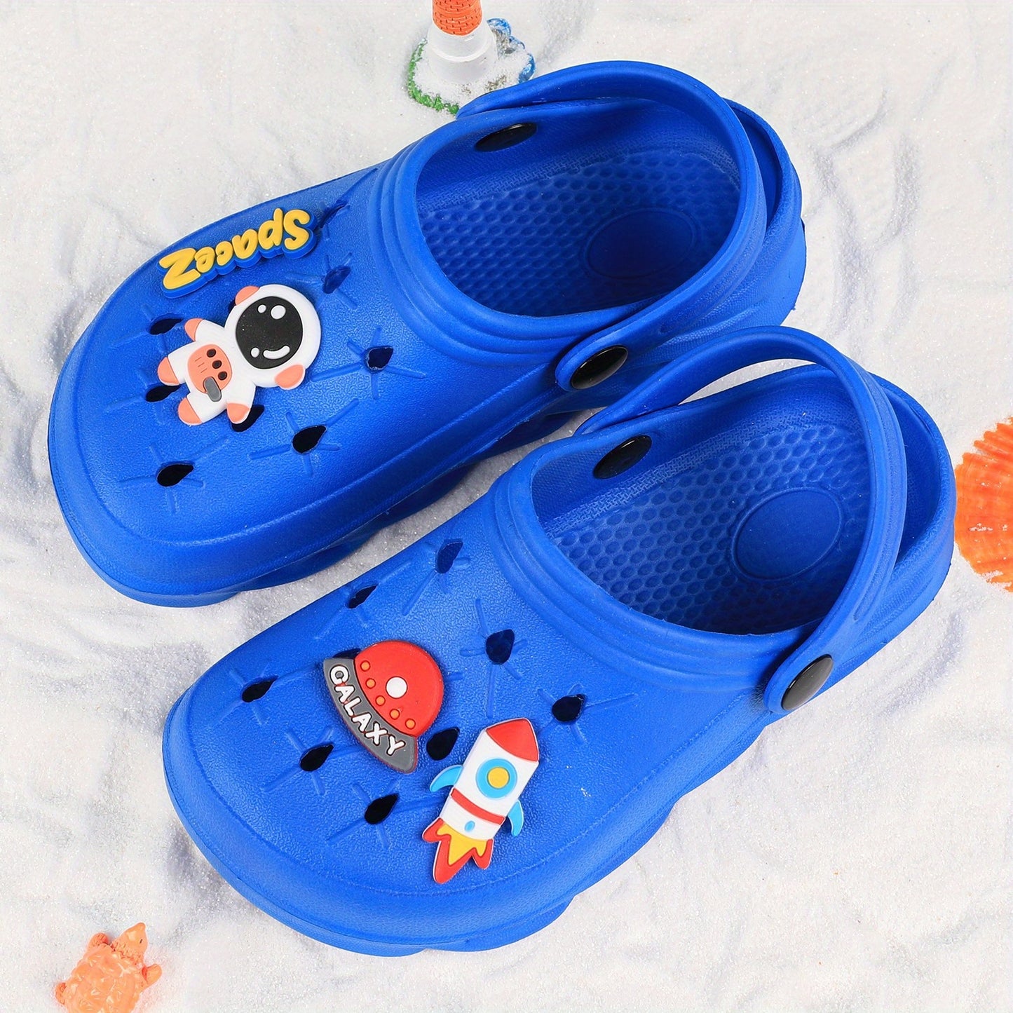 Stylish closed-toe slip-on sandals with cartoon charms for kids, breathable and non-slip for indoor and outdoor use.