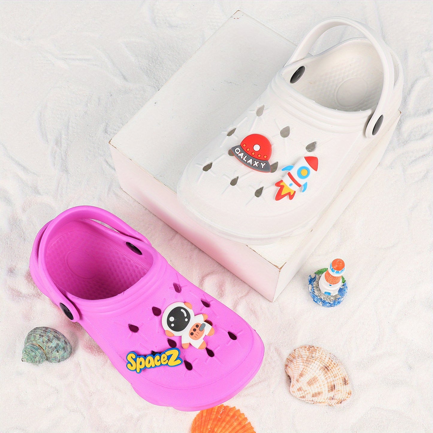 Stylish closed-toe slip-on sandals with cartoon charms for kids, breathable and non-slip for indoor and outdoor use.