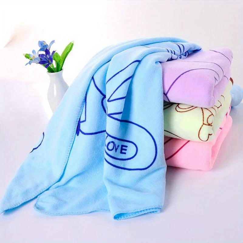 Cartoon rabbit love bath towel for women, with chest sling for easy wear. Made of fade-resistant, absorbent polyester. Soft, quick-dry, and contemporary style.