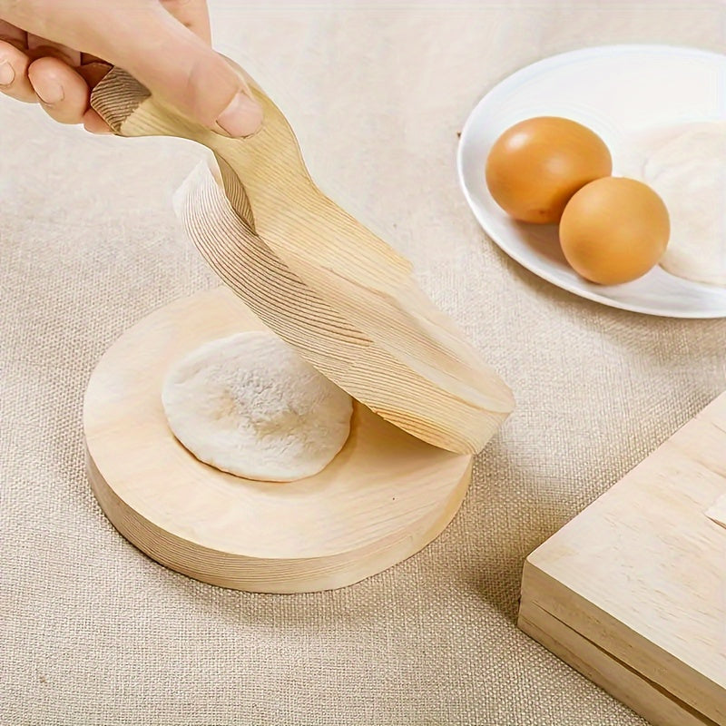 Solid wood dumpling wrapper press for home use, perfect for making dough buns. This auxiliary tool measures 19.0cm by 6.5cm.