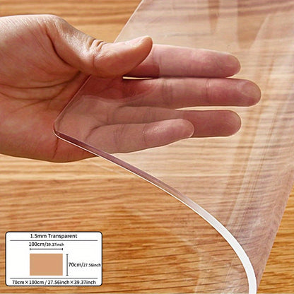 Premium 1pc PVC tablecloth protector, 1.5mm thick, scratch-resistant, easy to clean. Ideal for dining and coffee tables in homes and hotels. Transparent design with smooth texture.