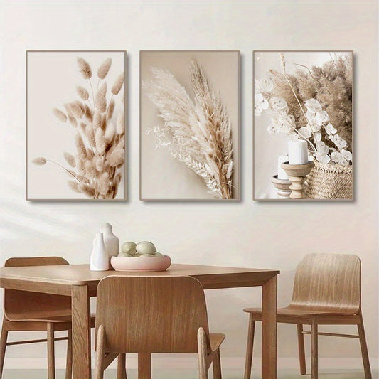 Modern 3-piece set of frameless canvas wall art with botanical prints of pampas grass and reed leaves, perfect for minimalist decor in any room of the home.