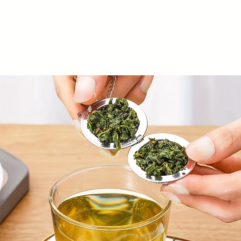 High-quality 304 stainless steel fine mesh tea and soup infuser ball for loose leaf tea, herbs, and spices. Sturdy construction with long chain hook for convenient use. Safe for food contact.