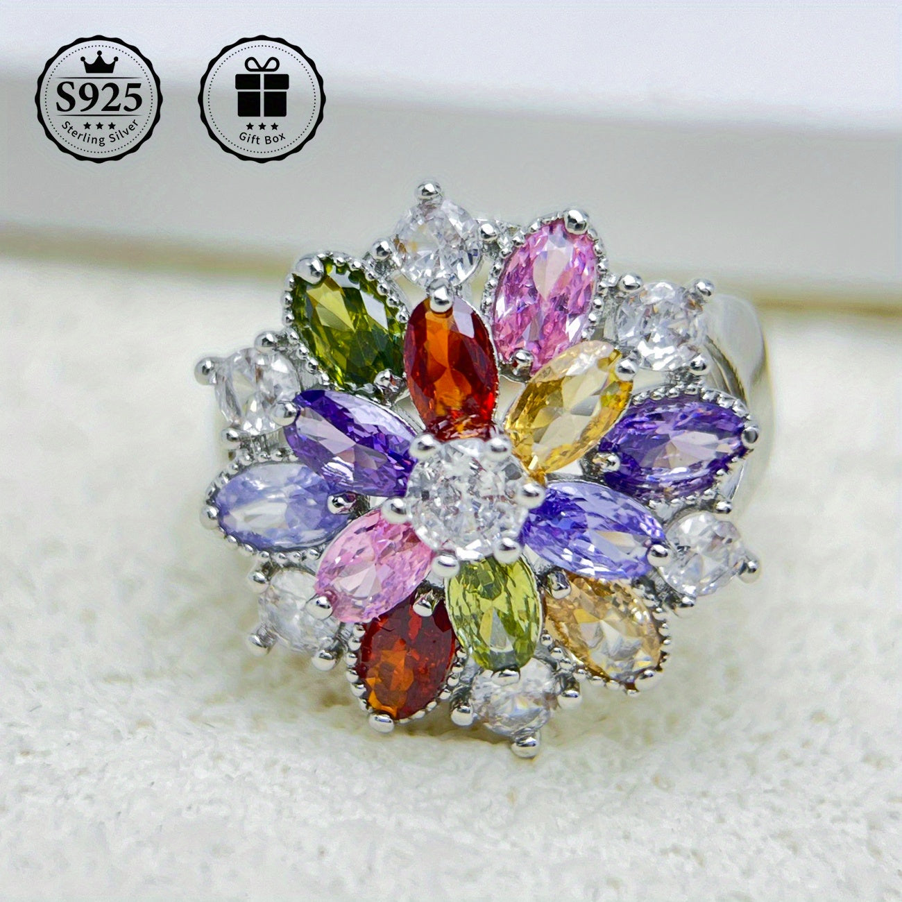 Sterling Silver Flower Ring embellished with 5A Grade Cut Zirconia Stones, ideal for special occasions like weddings and birthdays. Comes in a premium gift box, making it a high-quality present for friends and couples. Perfect for expressing love on