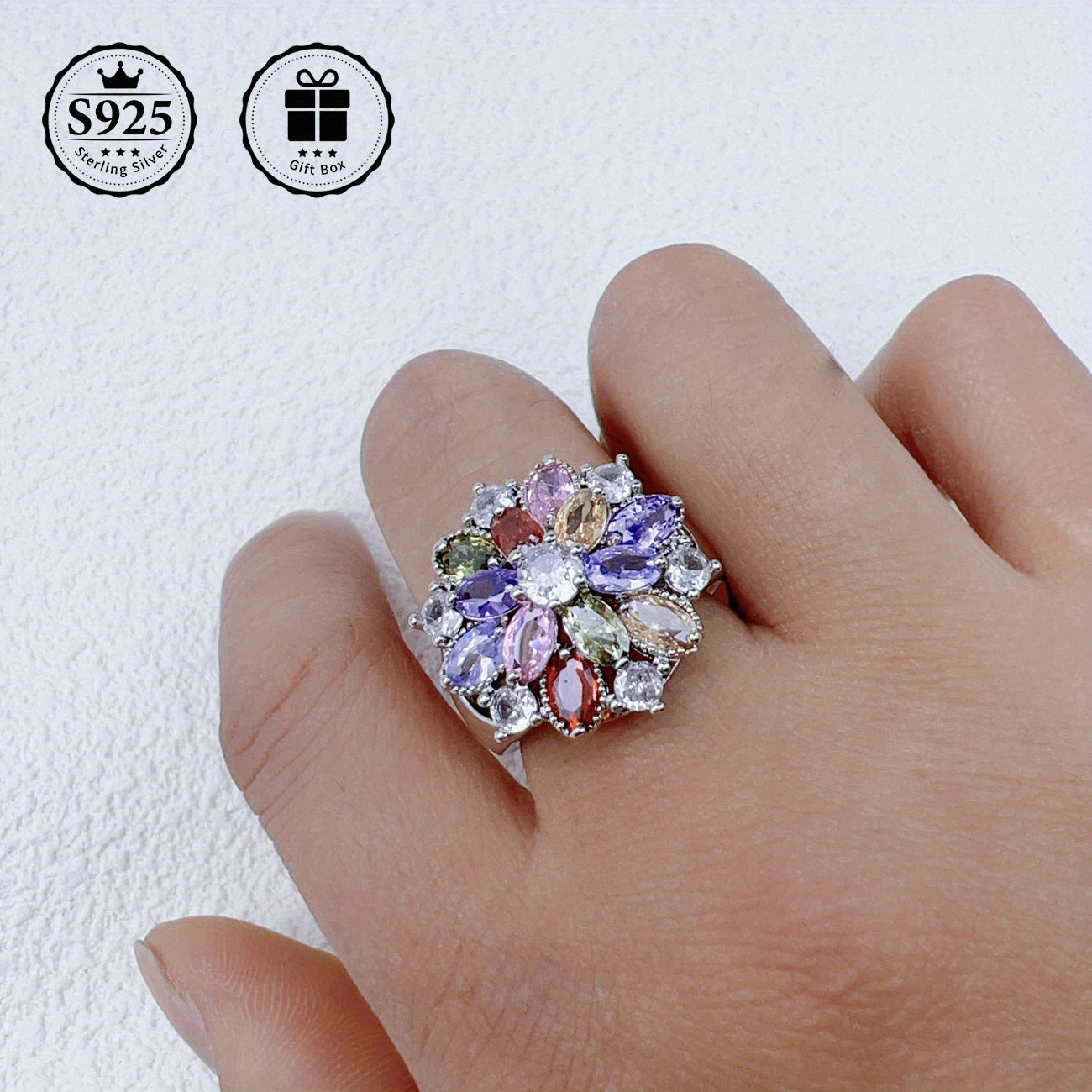 Sterling Silver Flower Ring embellished with 5A Grade Cut Zirconia Stones, ideal for special occasions like weddings and birthdays. Comes in a premium gift box, making it a high-quality present for friends and couples. Perfect for expressing love on