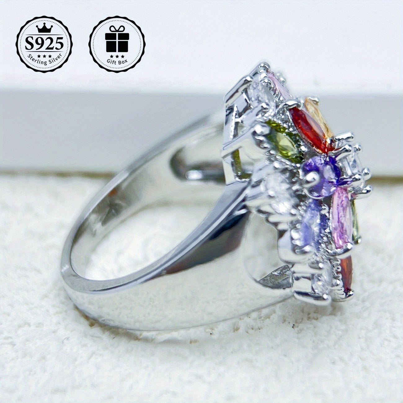 Sterling Silver Flower Ring embellished with 5A Grade Cut Zirconia Stones, ideal for special occasions like weddings and birthdays. Comes in a premium gift box, making it a high-quality present for friends and couples. Perfect for expressing love on