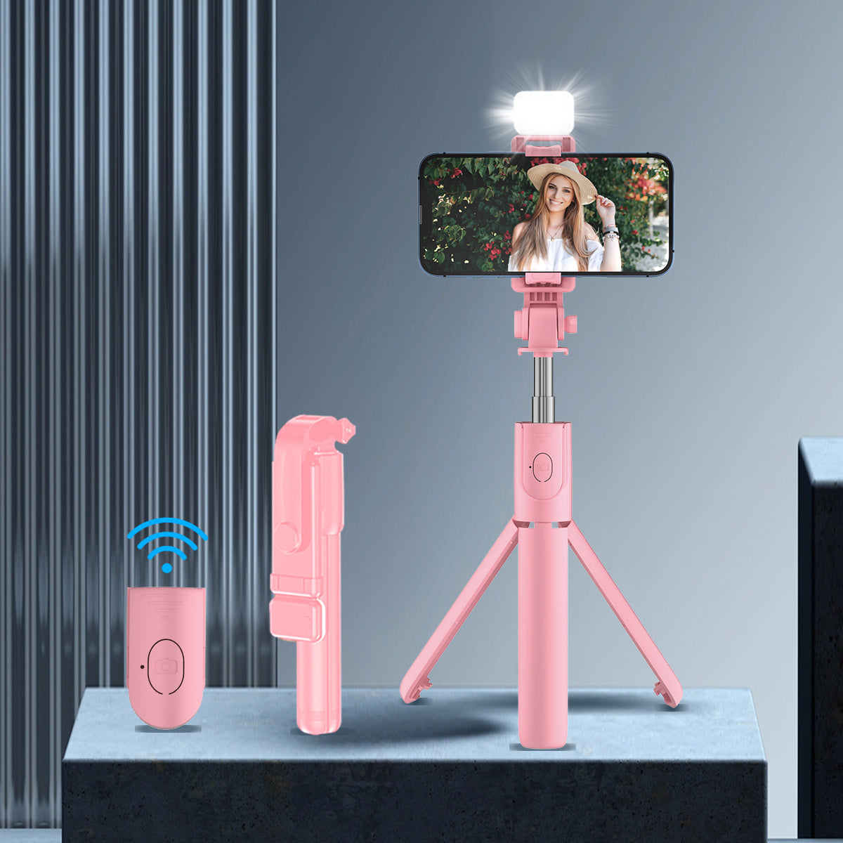 Universal selfie stick with tripod, wireless remote, ring light, built-in battery for live streaming and recording videos.