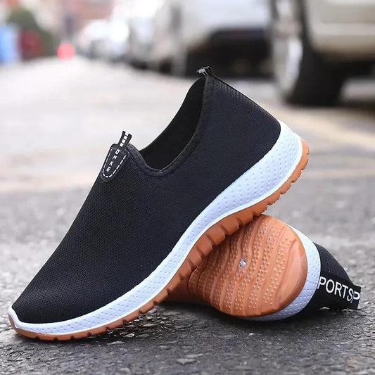 Middle aged men's slip on canvas walking shoes with non-slip rubber soles.