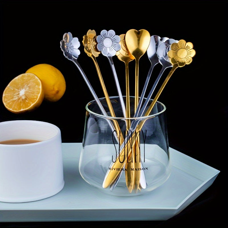 Set of 8 elegant floral stainless steel teaspoons with sunflower, rose, and daisy designs, perfect for coffee, desserts, and ice cream. Features golden finish, decorative handles, and