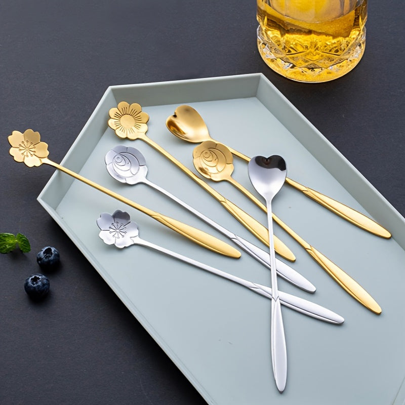 Set of 8 elegant floral stainless steel teaspoons with sunflower, rose, and daisy designs, perfect for coffee, desserts, and ice cream. Features golden finish, decorative handles, and