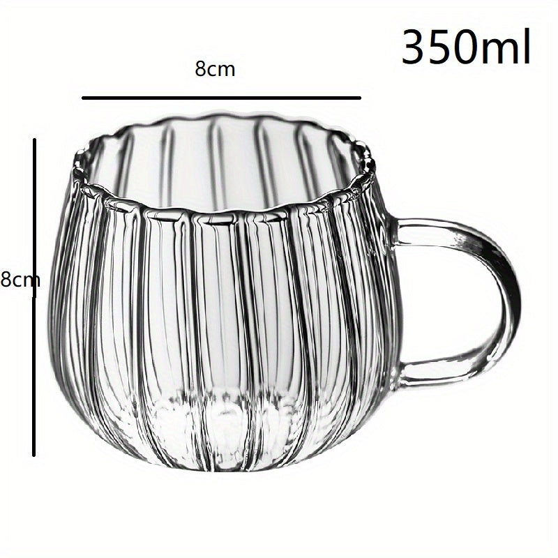 Heat-resistant glass mug with handle, 350ml capacity, ideal for enjoying coffee, tea, or hot chocolate. Features a charming pumpkin pattern design. Suitable for adult use, lead-free, and reusable. Hand wash recommended for maintenance.