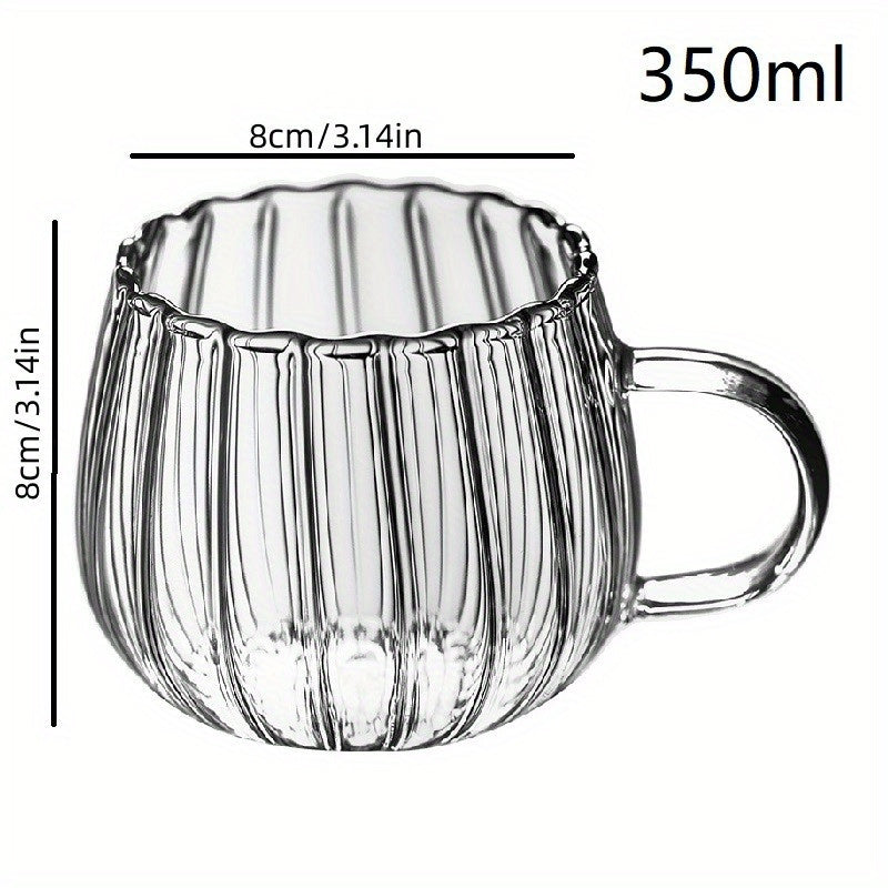 Heat-resistant glass mug with handle, 350ml capacity, ideal for enjoying coffee, tea, or hot chocolate. Features a charming pumpkin pattern design. Suitable for adult use, lead-free, and reusable. Hand wash recommended for maintenance.