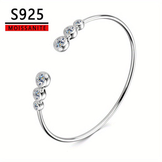 This elegant and versatile bracelet is made from 925 sterling silver with a moissanite inlaid design. It features a high-end European and American style that exudes classic and timeless charm. Perfect for both men and women, this bracelet adds a touch of