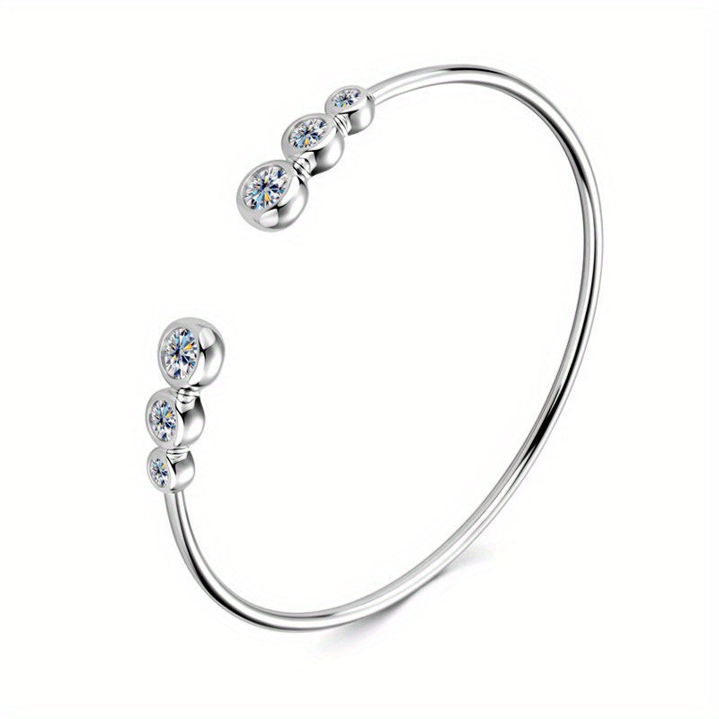 This elegant and versatile bracelet is made from 925 sterling silver with a moissanite inlaid design. It features a high-end European and American style that exudes classic and timeless charm. Perfect for both men and women, this bracelet adds a touch of