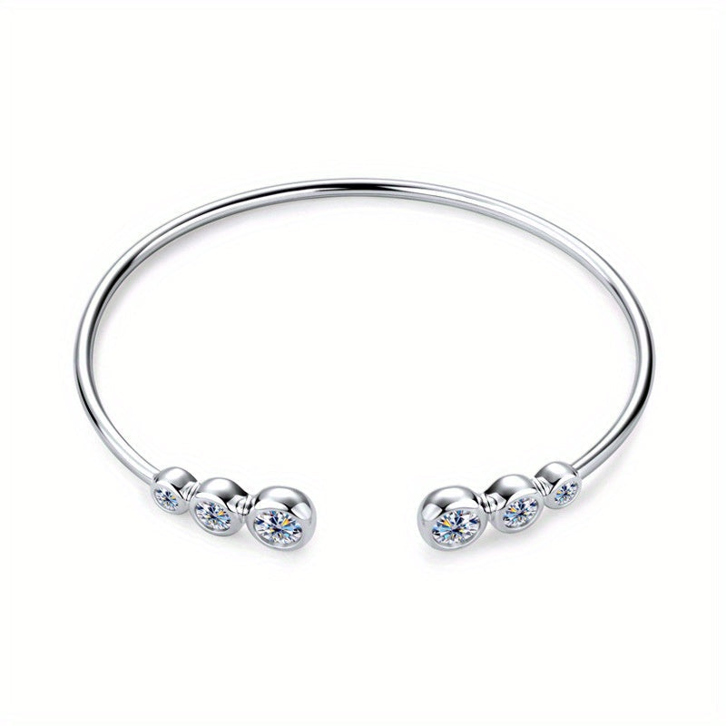 This elegant and versatile bracelet is made from 925 sterling silver with a moissanite inlaid design. It features a high-end European and American style that exudes classic and timeless charm. Perfect for both men and women, this bracelet adds a touch of