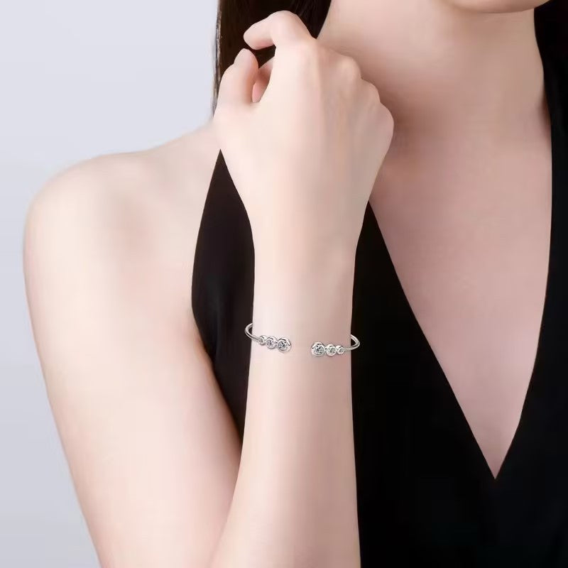 This elegant and versatile bracelet is made from 925 sterling silver with a moissanite inlaid design. It features a high-end European and American style that exudes classic and timeless charm. Perfect for both men and women, this bracelet adds a touch of