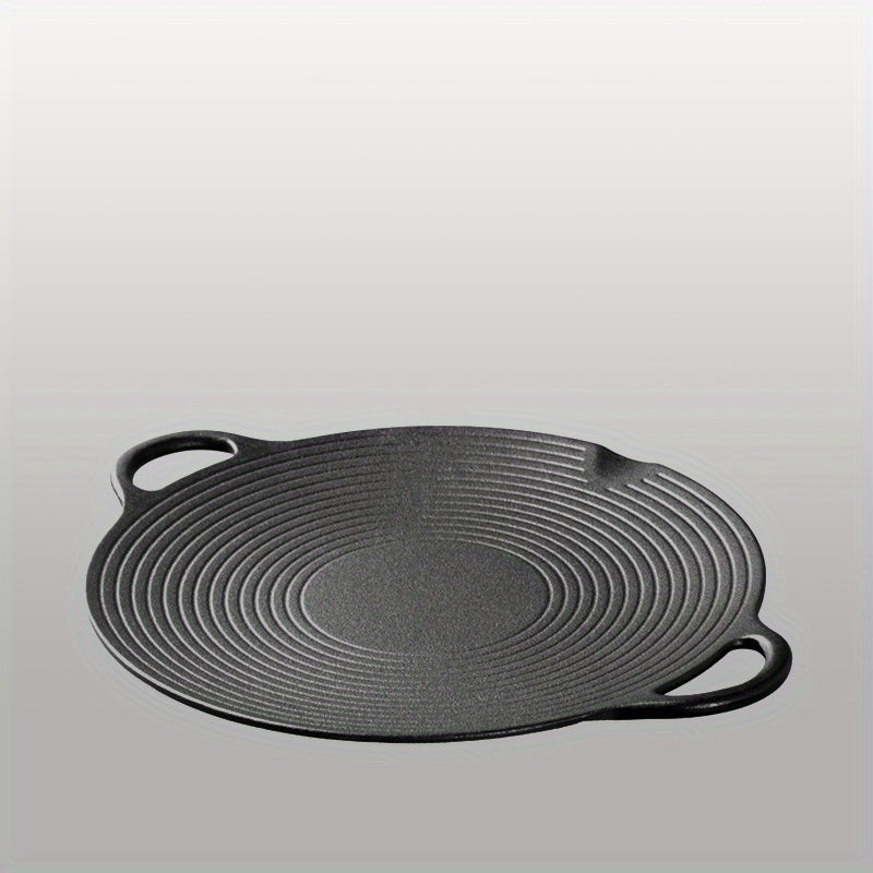 Single non-stick skillet made of cast iron with two handles for grilling and frying. Can be used on gas and induction stoves. Handwashing recommended.