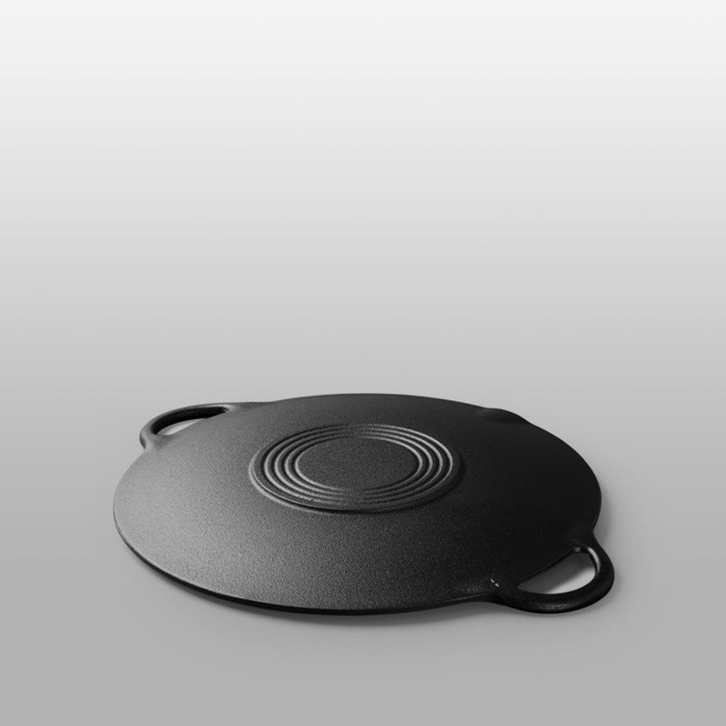 Single non-stick skillet made of cast iron with two handles for grilling and frying. Can be used on gas and induction stoves. Handwashing recommended.