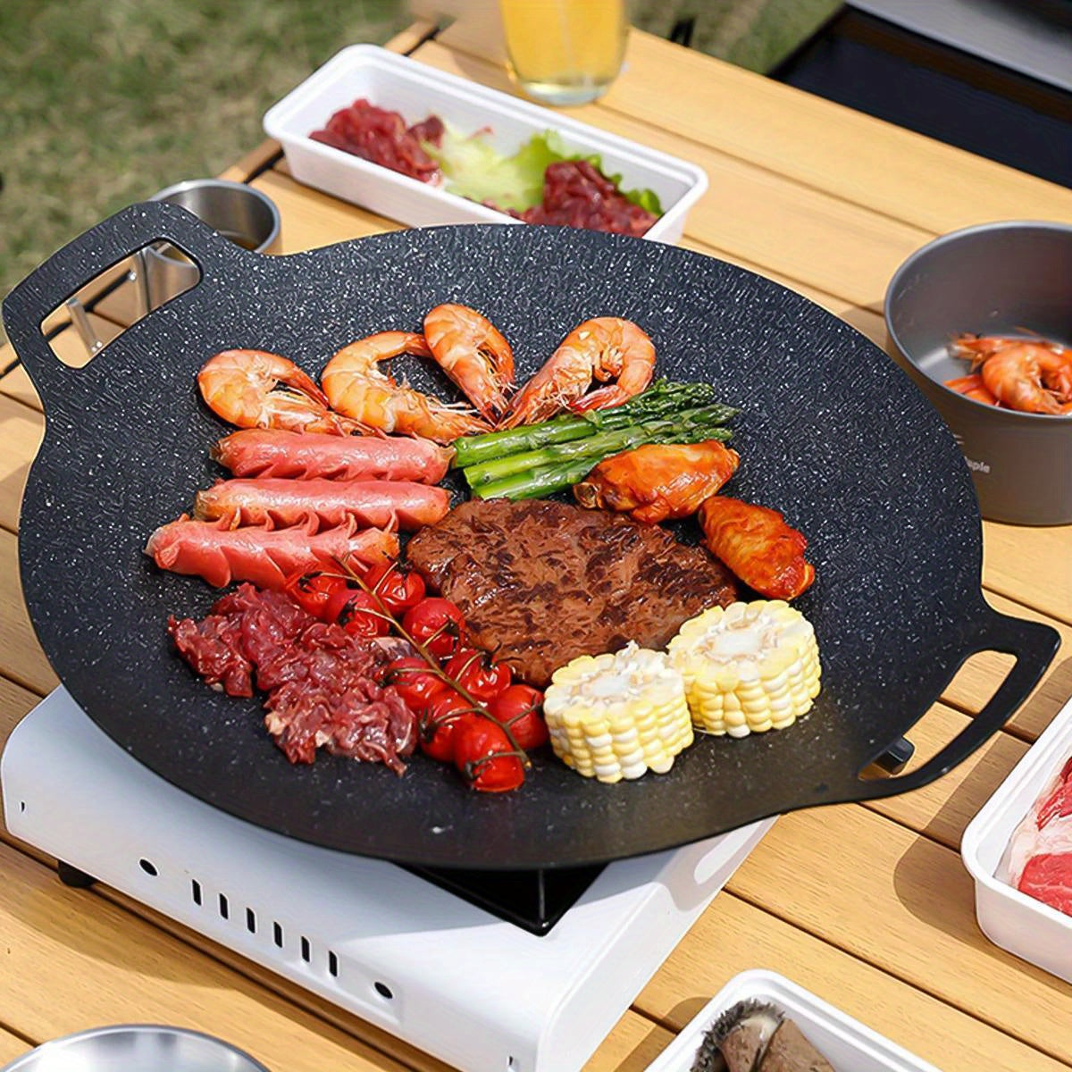 Get grilling with our Cast Iron BBQ Grill Pan - a Non-Stick Korean Barbecue Plate featuring convenient Integrated Handles. This versatile pan is Hand Wash Only and is suitable for use with Gas, Open Fire, Home & Outdoor Cooking. With its Multipurpose