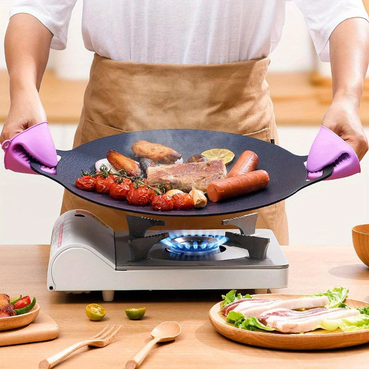 Get grilling with our Cast Iron BBQ Grill Pan - a Non-Stick Korean Barbecue Plate featuring convenient Integrated Handles. This versatile pan is Hand Wash Only and is suitable for use with Gas, Open Fire, Home & Outdoor Cooking. With its Multipurpose