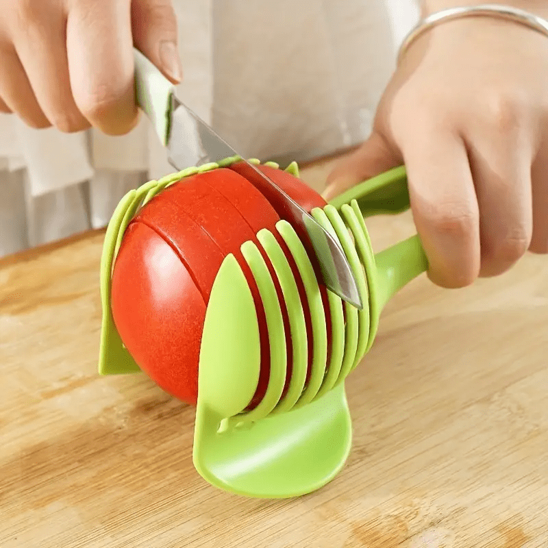 Multipurpose kitchen slicer for tomatoes, lemons, and more. Made of durable plastic for home and restaurant use. Includes round fruit tongs, egg slicer, and other kitchen tools.