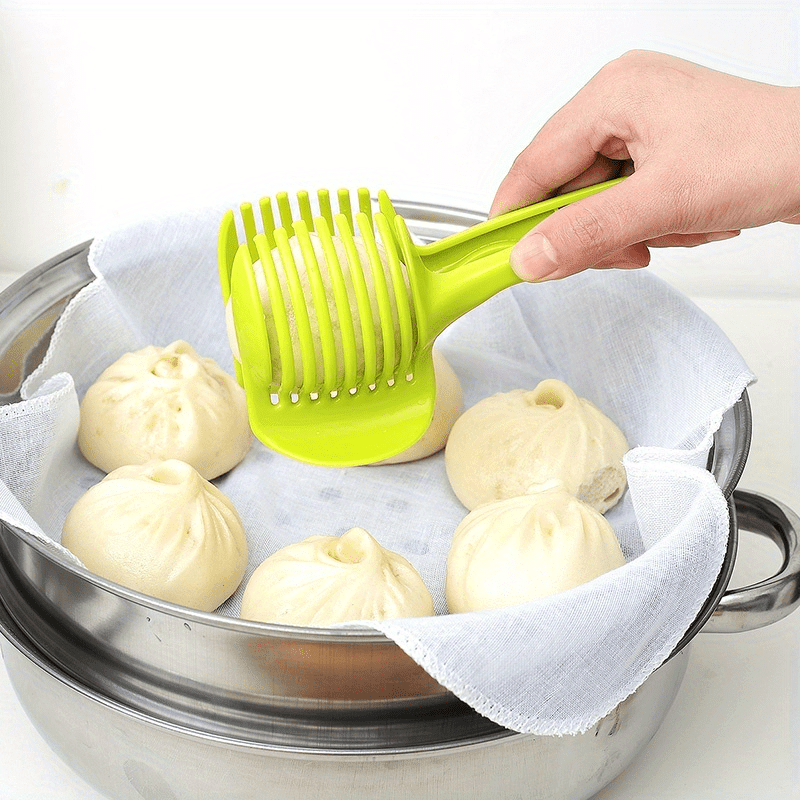 Multipurpose kitchen slicer for tomatoes, lemons, and more. Made of durable plastic for home and restaurant use. Includes round fruit tongs, egg slicer, and other kitchen tools.