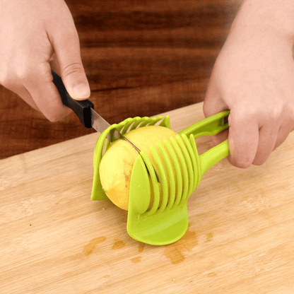 Multipurpose kitchen slicer for tomatoes, lemons, and more. Made of durable plastic for home and restaurant use. Includes round fruit tongs, egg slicer, and other kitchen tools.