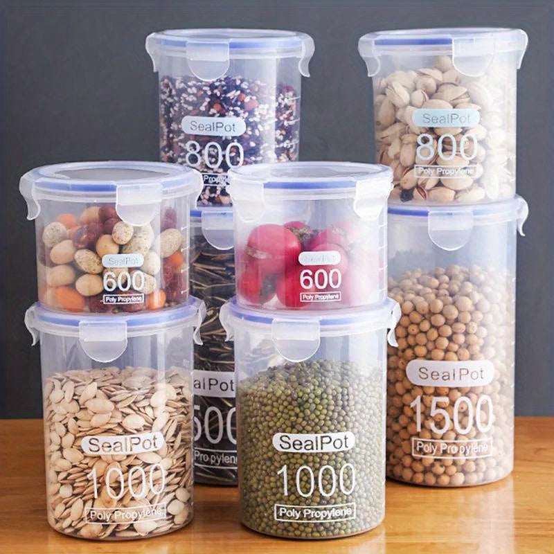 Set of airtight food storage containers made of polycarbonate with sealed jars - reusable and versatile, suitable for freezer storage, BPA-free. These round SealPots are perfect for organizing in your home and kitchen, featuring a leak-proof gull wing