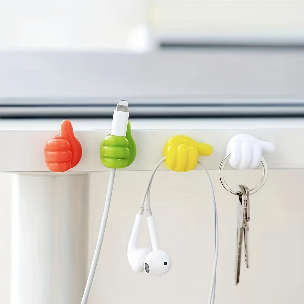 10pcs cartoon thumb hook sticky hooks for seamless cable organization on walls.