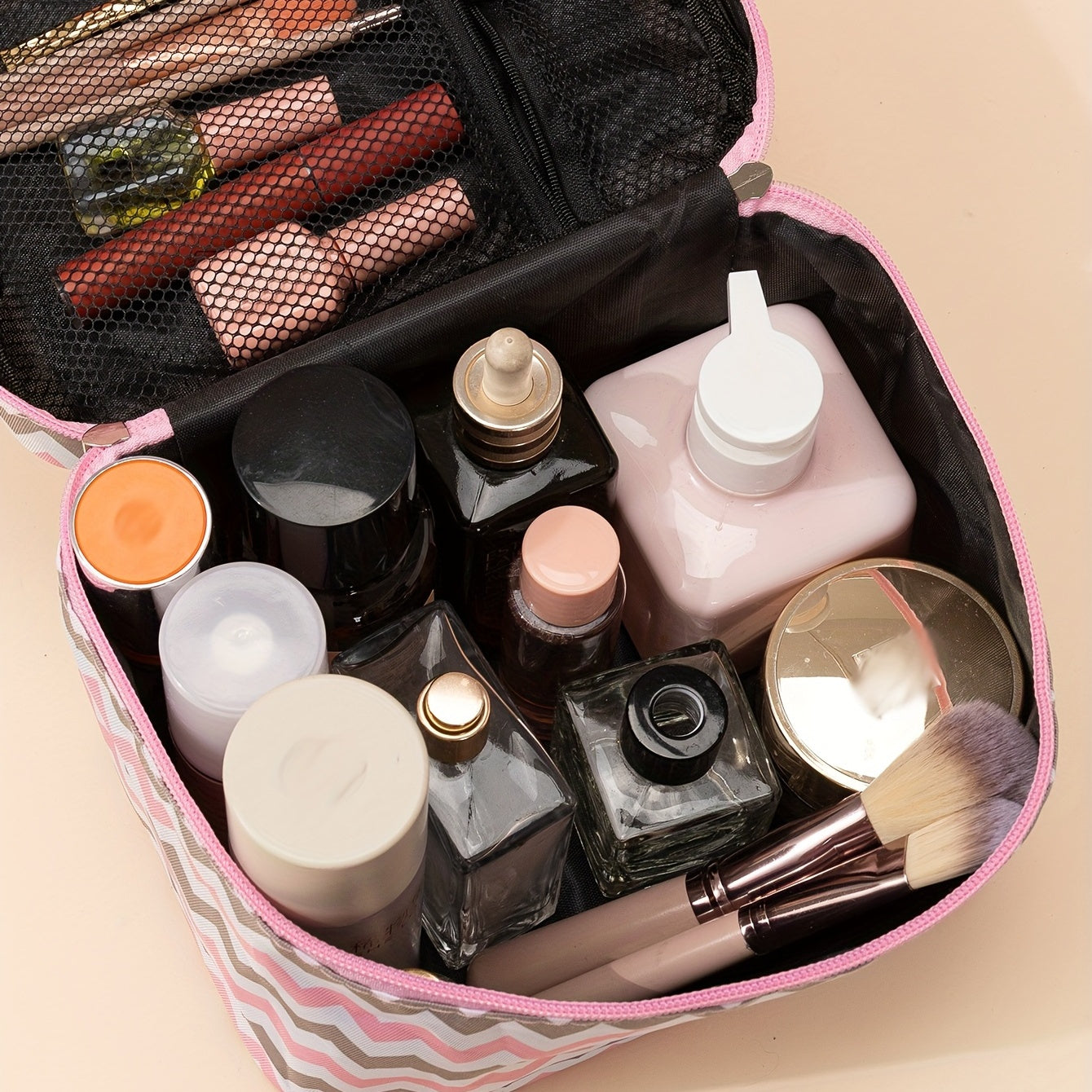 Travel portable makeup bag with ample storage capacity and convenient zipper closure, perfect for keeping makeup essentials organized while on the go.