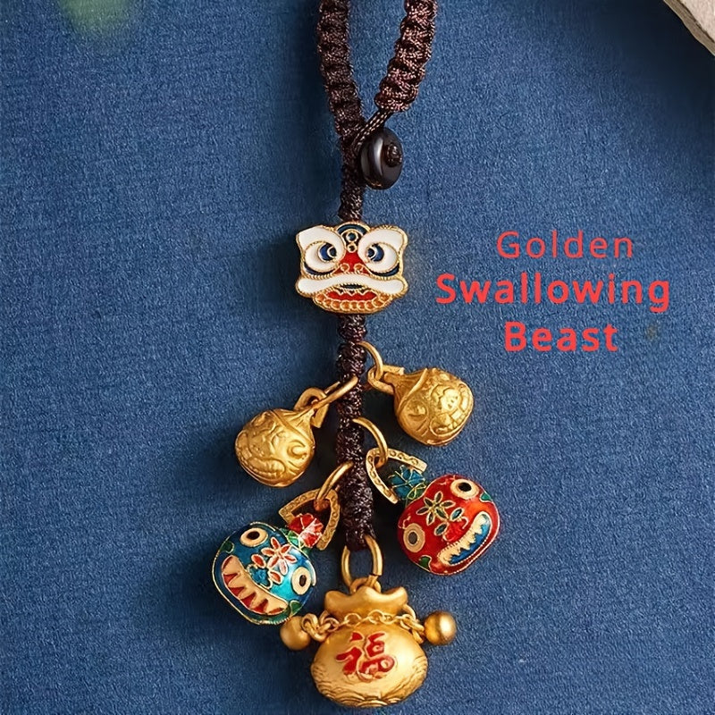 Golden Keychain Pendant featuring the Lucky God of Wealth, an Ancient design with a Copper Swallowing Golden Beast, perfect for hanging on a car bag or bringing luck to a family of three.