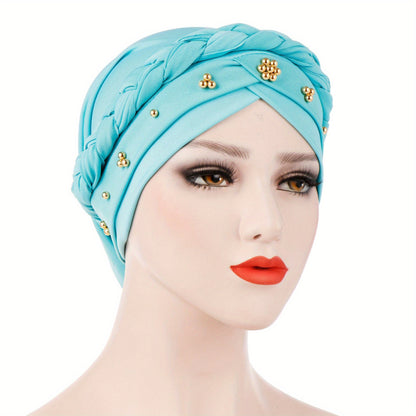 Muslim style headscarf and braided hat with golden bead detailing, made of polyester.