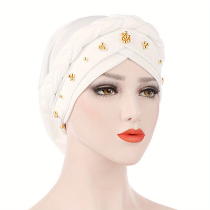 Muslim style headscarf and braided hat with golden bead detailing, made of polyester.