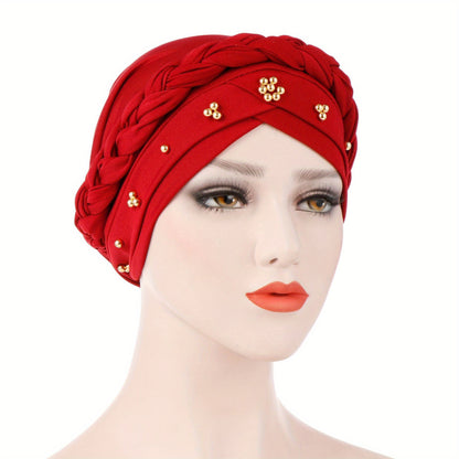 Muslim style headscarf and braided hat with golden bead detailing, made of polyester.