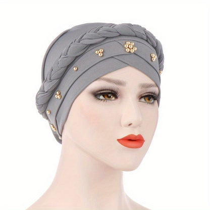 Muslim style headscarf and braided hat with golden bead detailing, made of polyester.