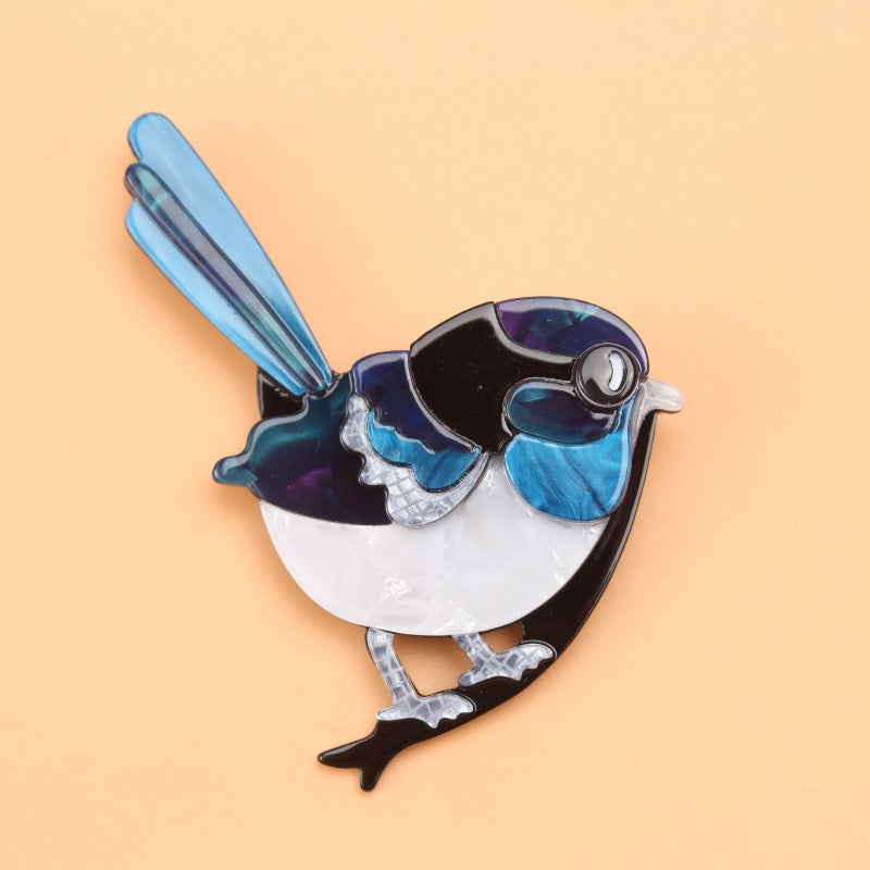 Women's handmade acrylic bird brooch made from acetate material, perfect as a wedding accessory.