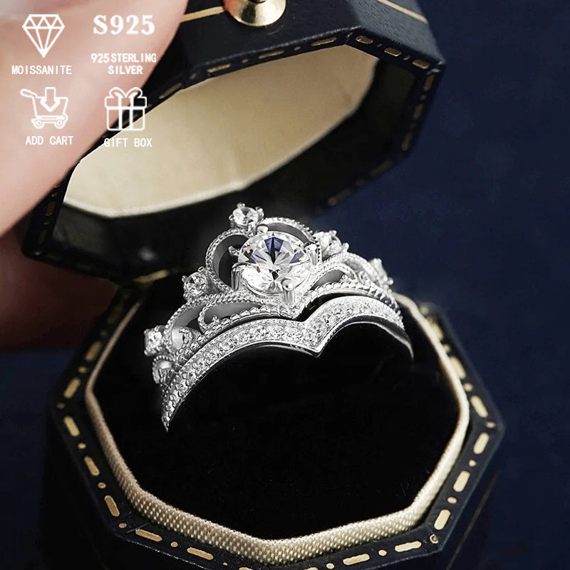 This exquisite Bridal Set features a Royal Crown Design made of high-quality 925 Sterling Silver. The stunning 0.5 Carat Round Moissanite Engagement and Wedding Ring Set is secured in a 4-Prong Setting. Perfect for those with sensitive skin, it is