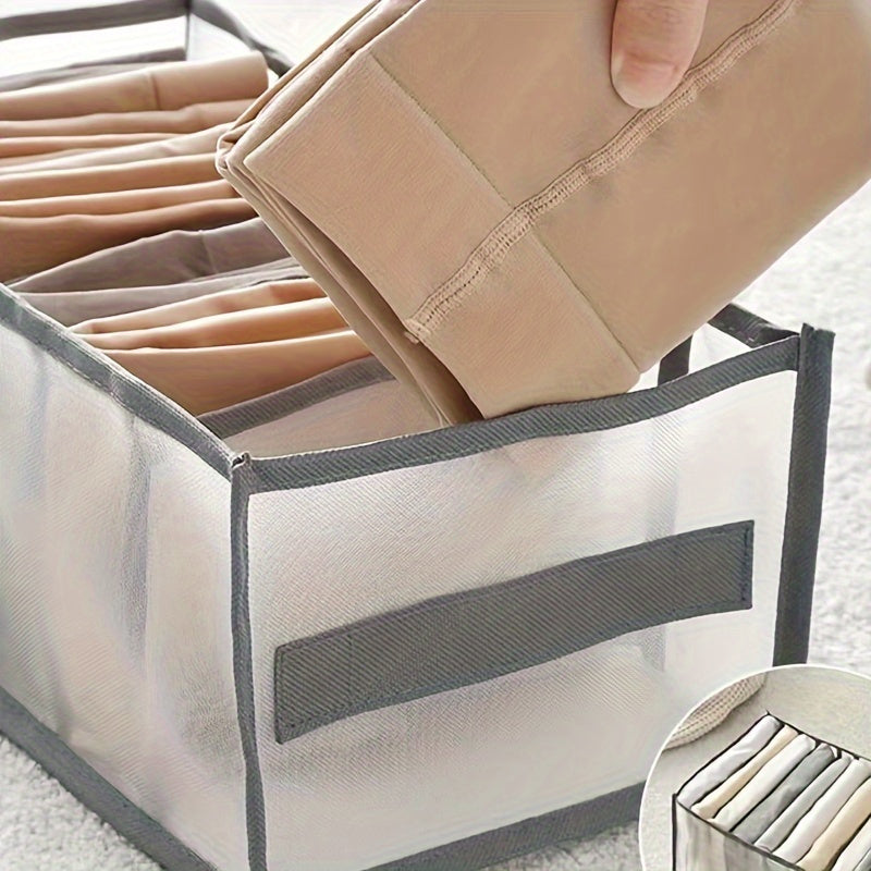 Organize your wardrobe with these fabric drawer divider storage bins featuring handles. With 7 grids, these bins are perfect for organizing clothes like jeans and shirts. They are washable and foldable for easy storage. Stackable for maximum convenience.