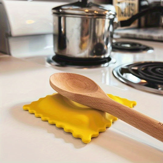 Cute cartoon silicone spoon rest: heat-resistant, non-slip mat for kitchen spoons & ladles.