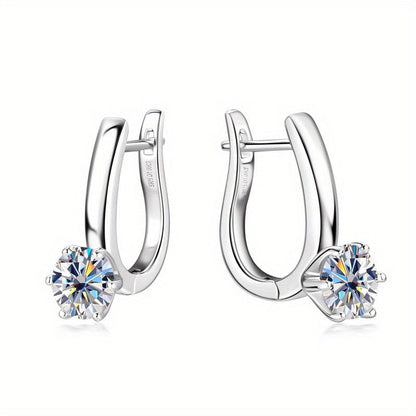 These stylish 925 Sterling Silver Moissanite Classic Six-claw Earrings are versatile and fashionable. They have a simple design with a hip-hop rock style, giving them a light luxury feel. These earrings are perfect for those who have a niche for romantic