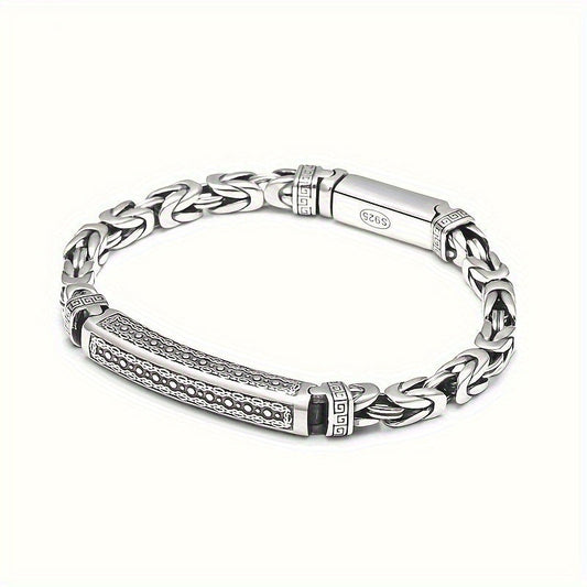 Sleek and stylish, this Sterling Silver S925 bracelet features a unique Four-Sided Fortune Peace pattern and a retro polished braided chain. The trendy accessory is perfect for casual attire, weighing 26g. These simple and versatile accessories are a