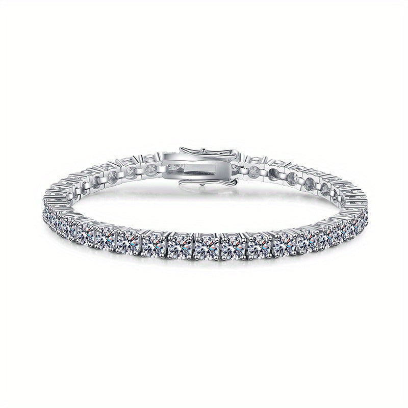 Beautiful and elegant 0.5/1 carat round Moissanite bracelet in a timeless design crafted in 925 sterling silver. This stunning piece is the perfect gift for Valentine's Day for that special woman in your life. Weighing 13.55 grams, this brilliant and