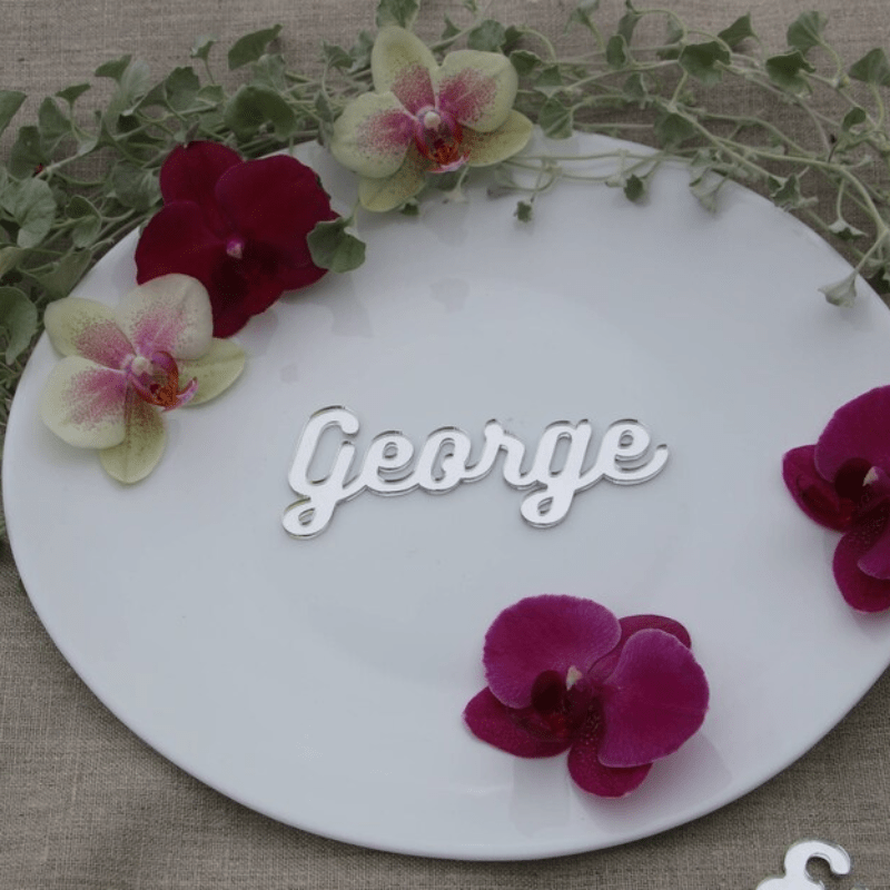 Customize your event with a personalized acrylic place card for weddings, birthday parties, and other special occasions. Make your table setting decor unique with a customizable guest name sign.