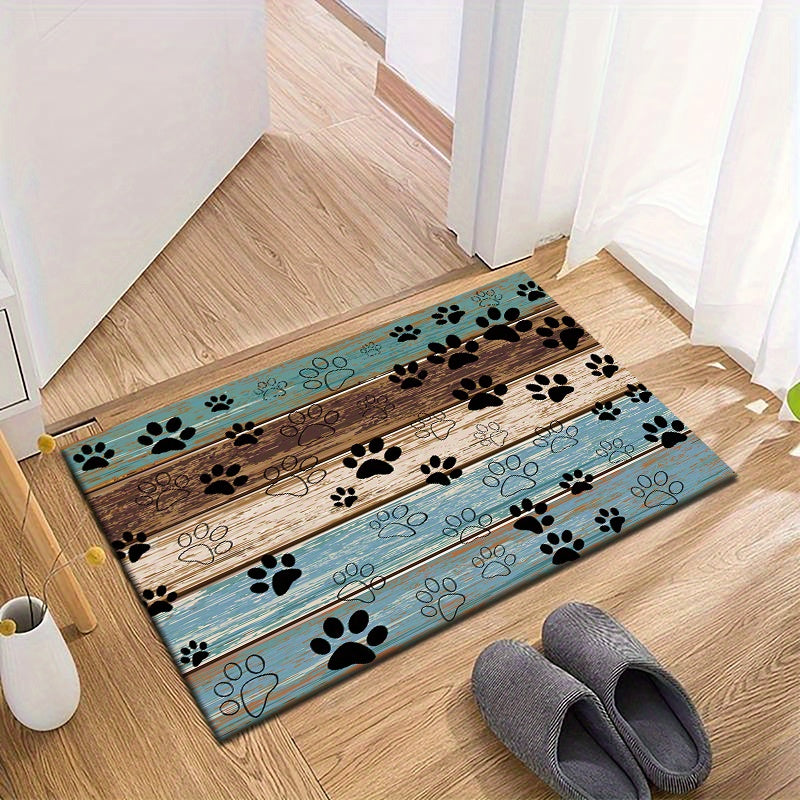 Welcome guests in style with the Paw Print Welcome Door Rug, perfect for both indoor and outdoor use. This durable, anti-slip, and quick-dry rug is a stylish addition to any living room, bedroom, bathroom, kitchen, patio, or laundry room. Its