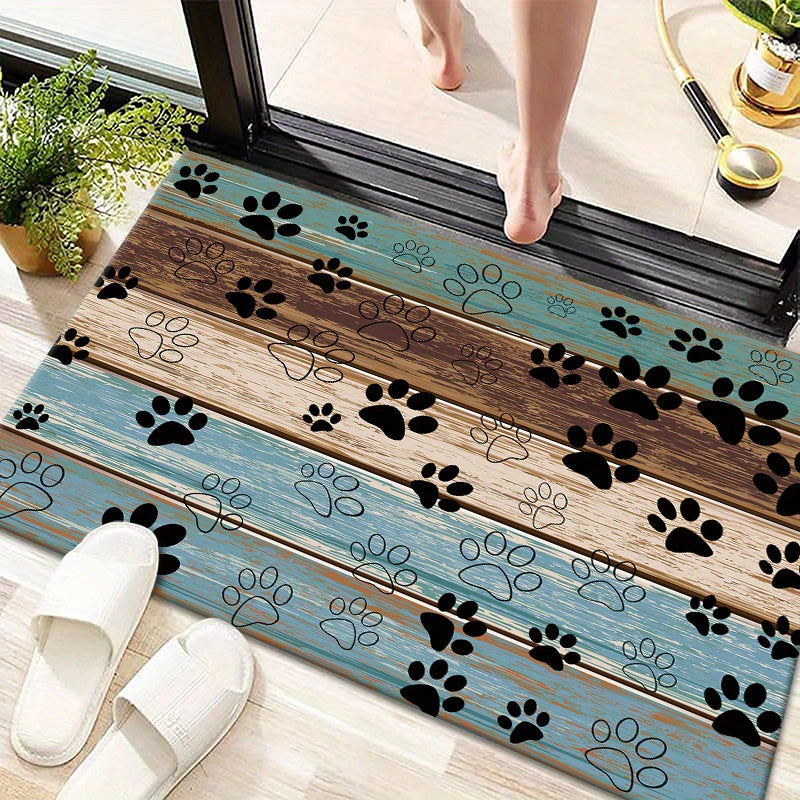 Welcome guests in style with the Paw Print Welcome Door Rug, perfect for both indoor and outdoor use. This durable, anti-slip, and quick-dry rug is a stylish addition to any living room, bedroom, bathroom, kitchen, patio, or laundry room. Its