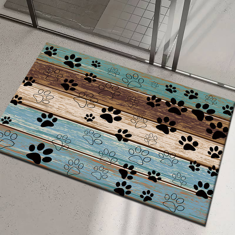 Welcome guests in style with the Paw Print Welcome Door Rug, perfect for both indoor and outdoor use. This durable, anti-slip, and quick-dry rug is a stylish addition to any living room, bedroom, bathroom, kitchen, patio, or laundry room. Its