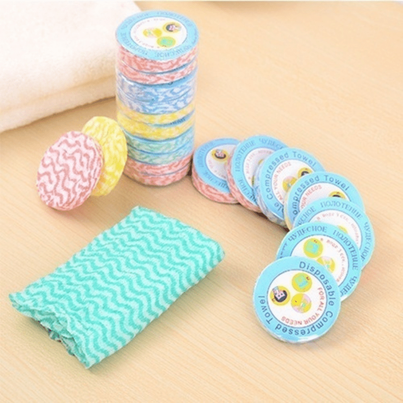 10 pieces of 100% cotton compressed washcloths with a lightweight, woven towel set featuring a polka dot design, character theme. Portable and quick expandable oblong shape for travel and home use.